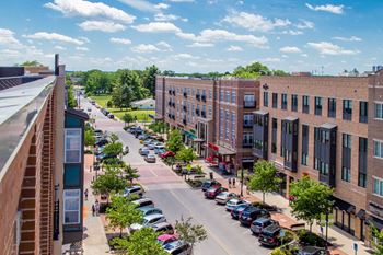 an aerial view of a city street with cars parked at The Foundry, South Bend Indiana